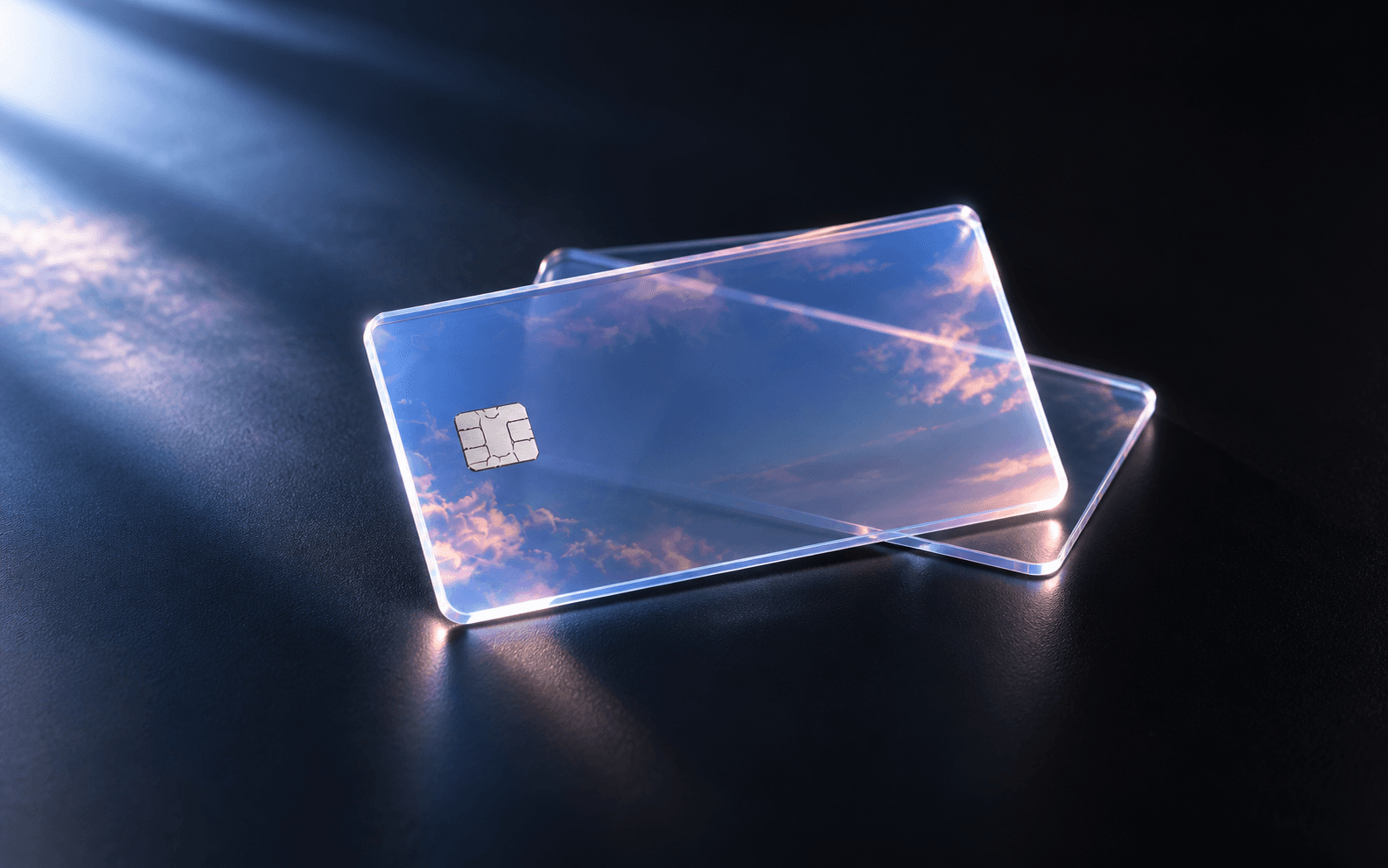 Two transparent Locus cards on an obsidian surface